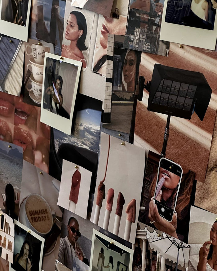 Collage of various photos and images on a wall.