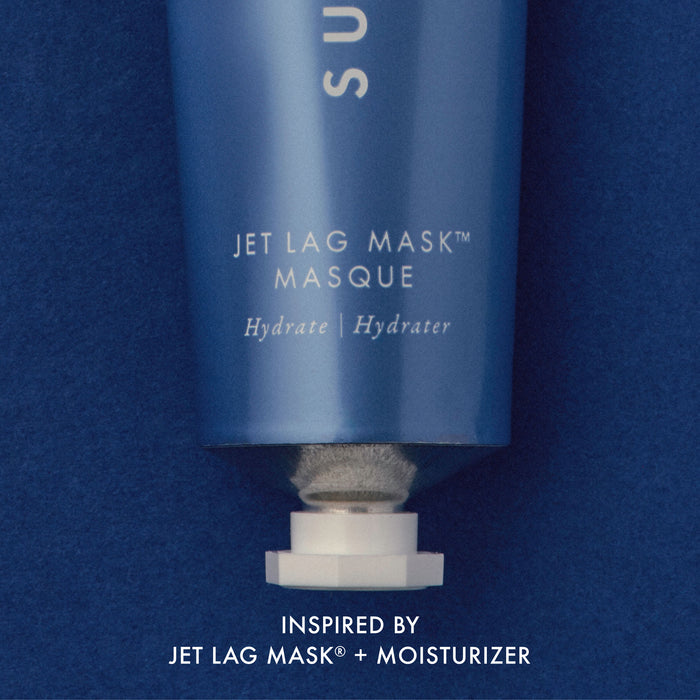 Blue skincare mask bottle labeled 'Jet Lag Mask Masque' on a blue background