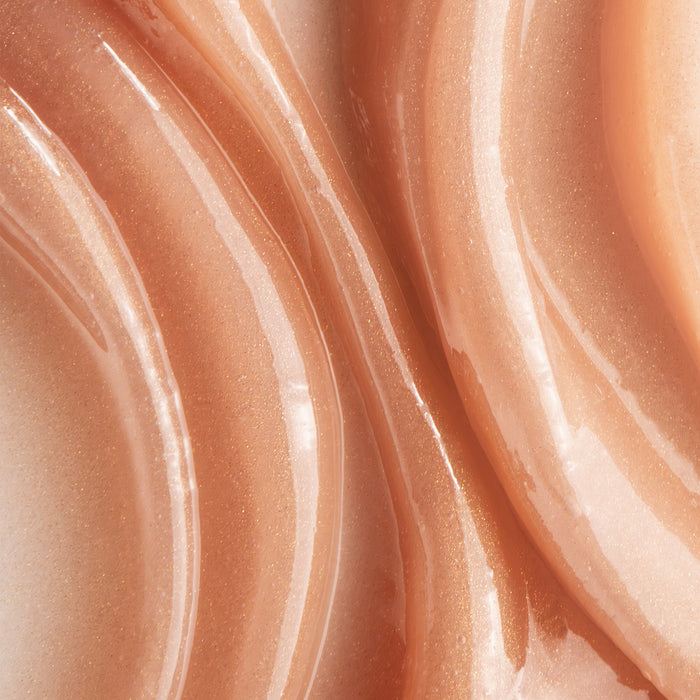 Close-up of smooth, pinkish-beige cream texture