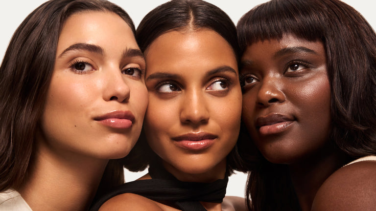 Three women with different skin shades